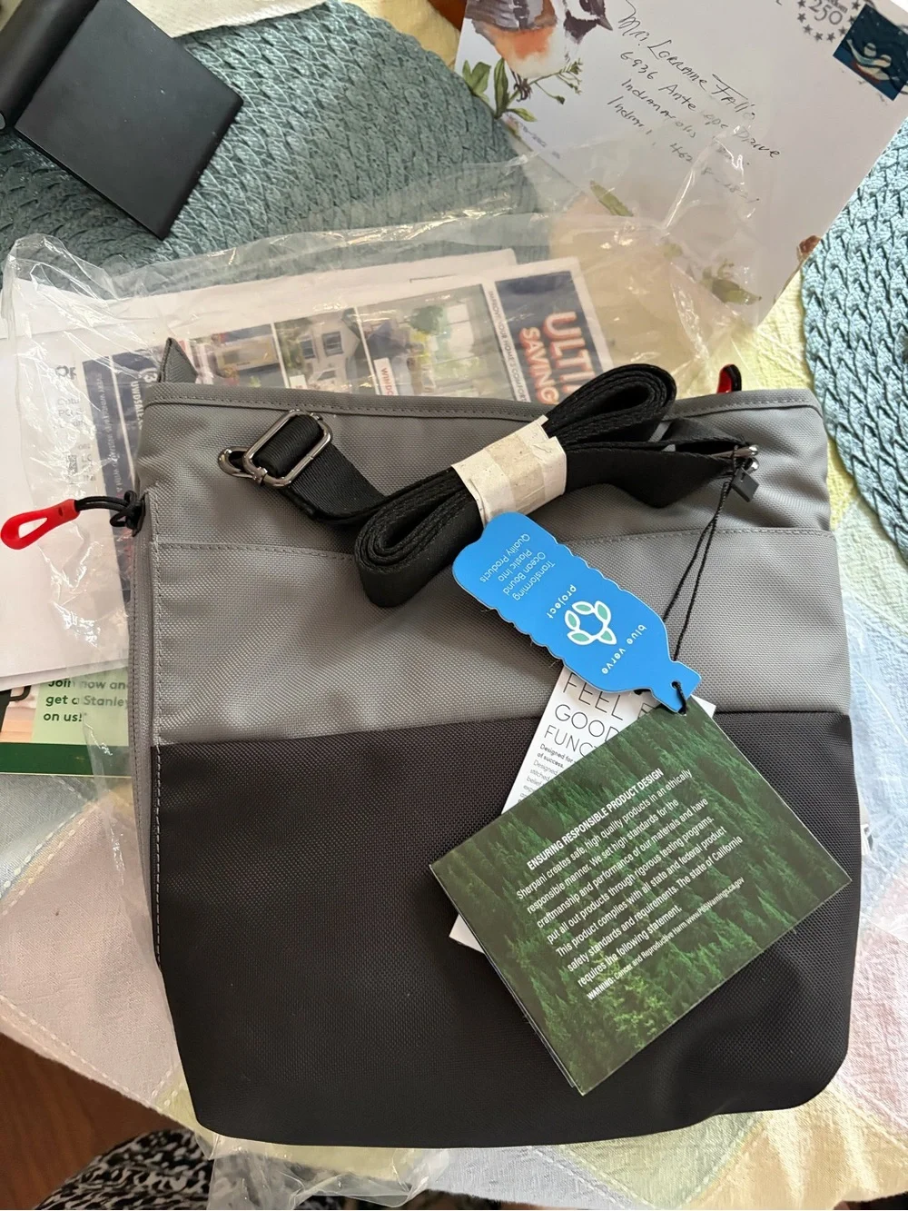 Sherpani Gray and Black Crossbody Messenger with Red Zipper Accents
